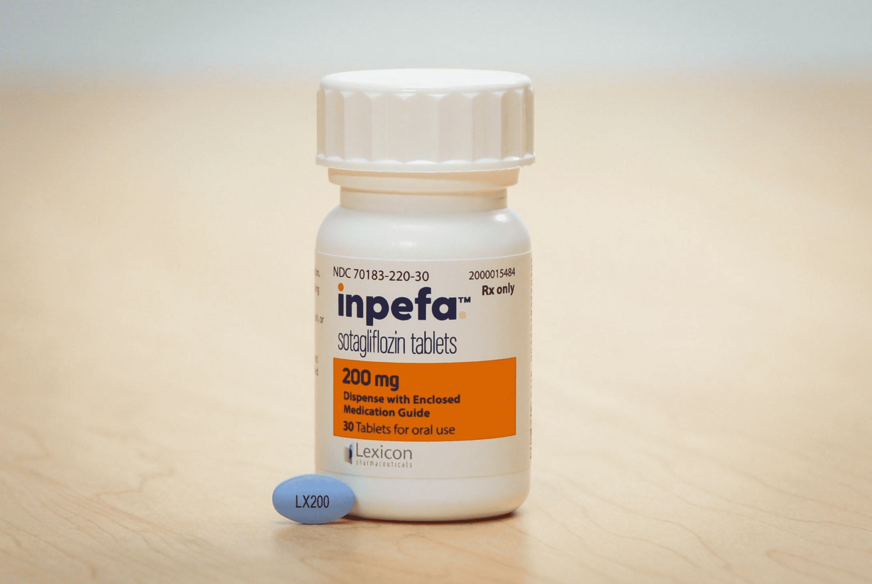 INPEFA bottle with a blue oval-shaped pill labeled LX200